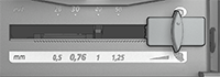 Slide the card thickness gauge to maximum thickness